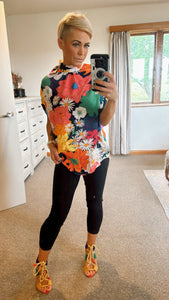 Bold coloured floral print tie neck batwing sleeve top