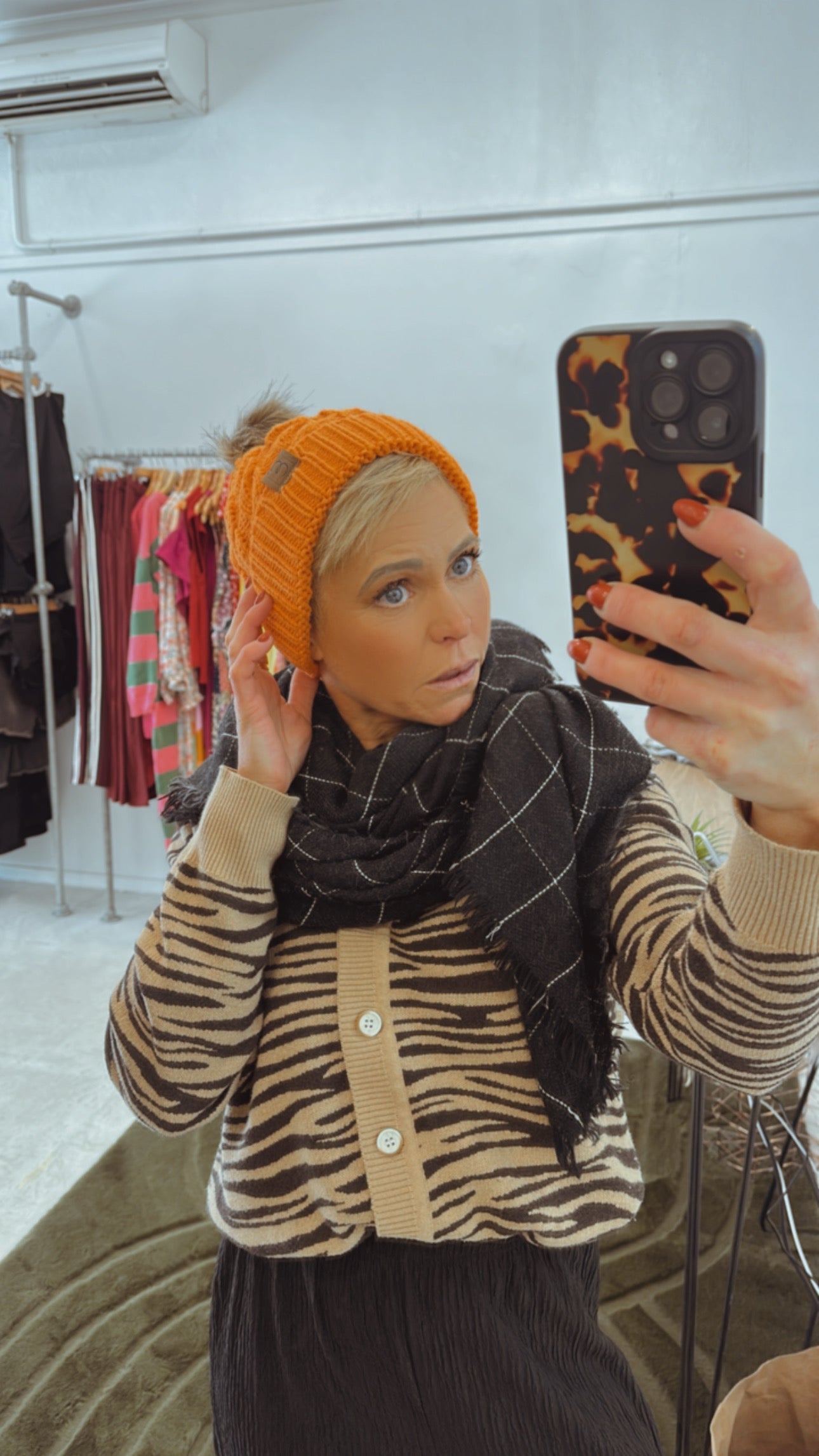 Orange knit Pom Pom beanie