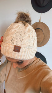 Beige pom pom beanie