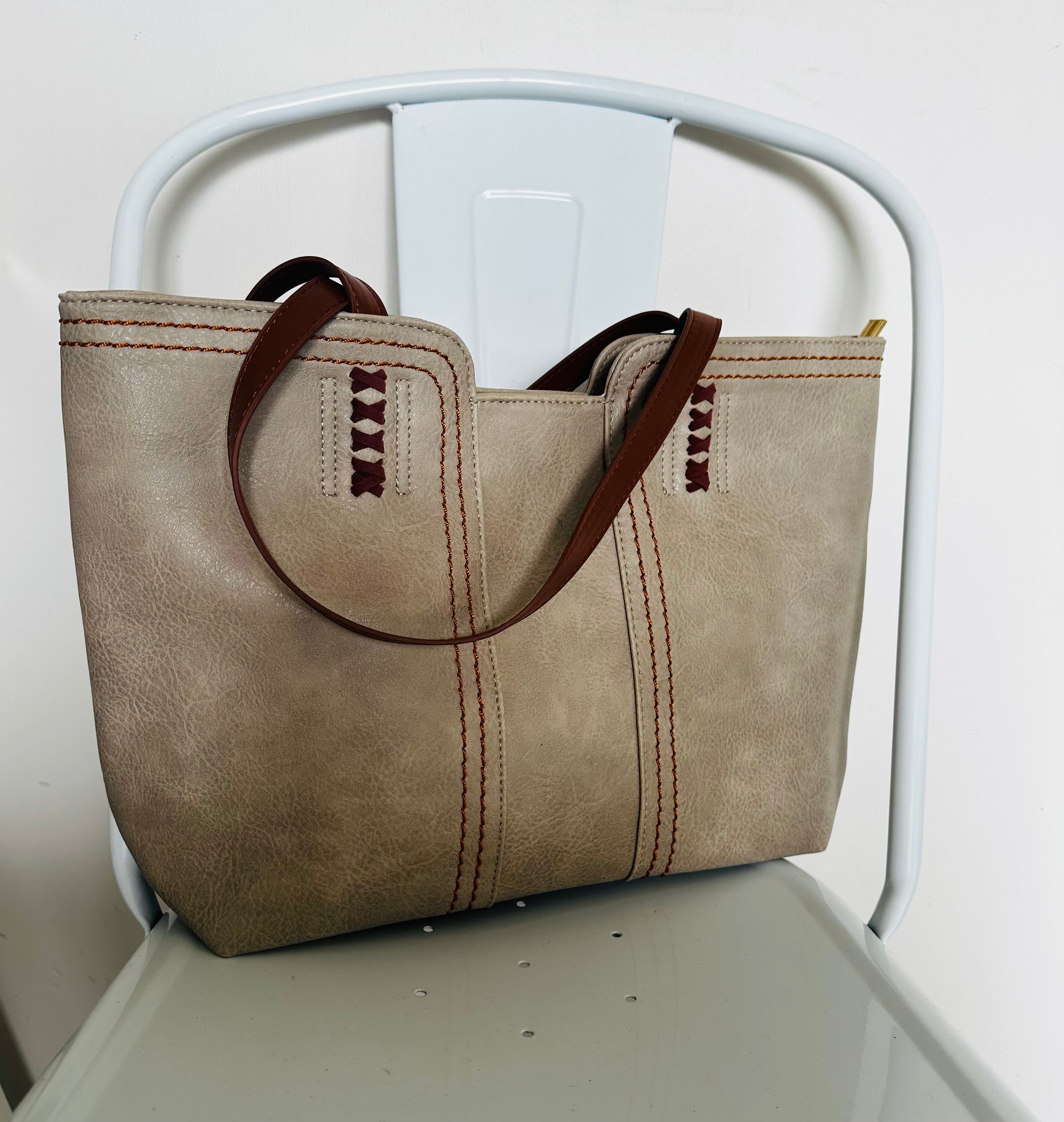 Grey vintage tote bag with tan straps