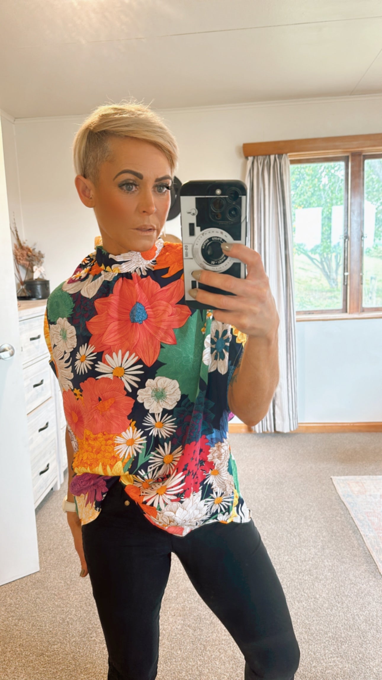 Bold coloured floral print tie neck batwing sleeve top