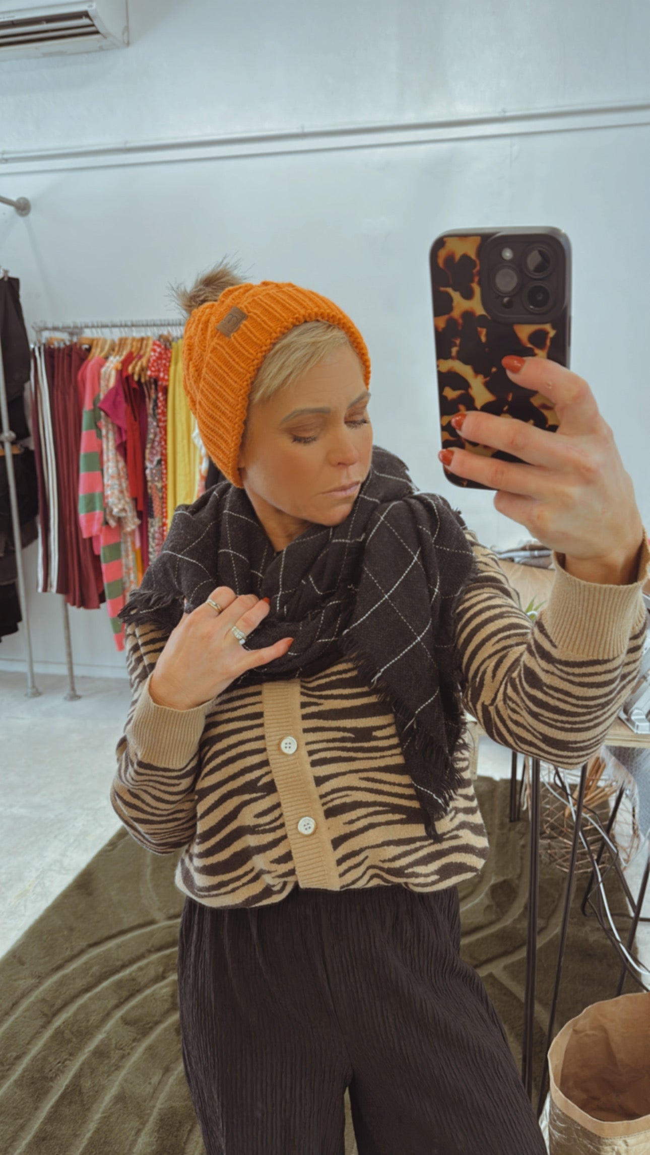 Orange knit Pom Pom beanie