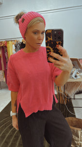 Bright pink cropped split front knit top