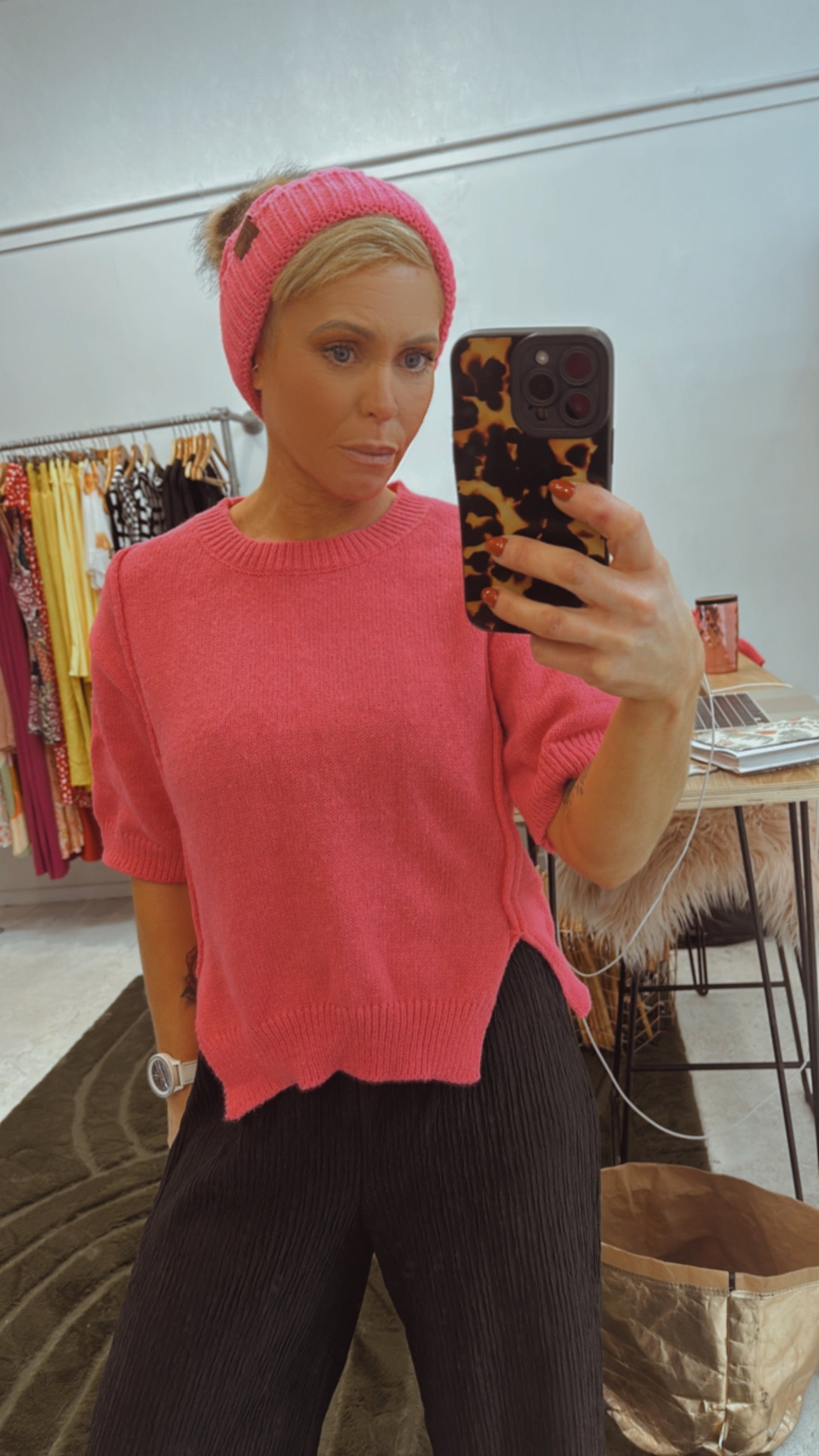 Bright pink cropped split front knit top