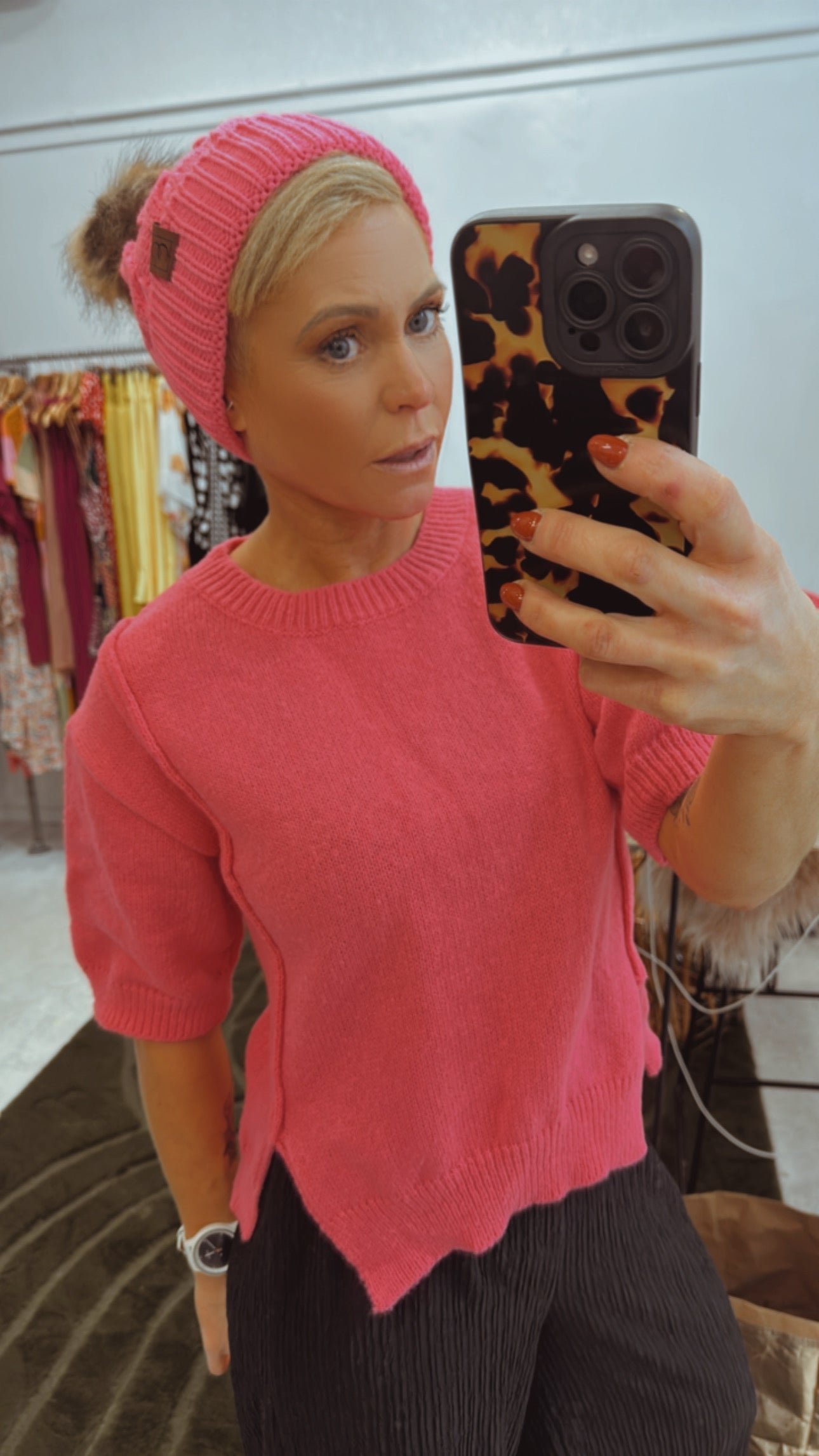 Bright pink cropped split front knit top