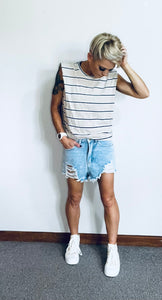 Raw edge distressed denim shorts