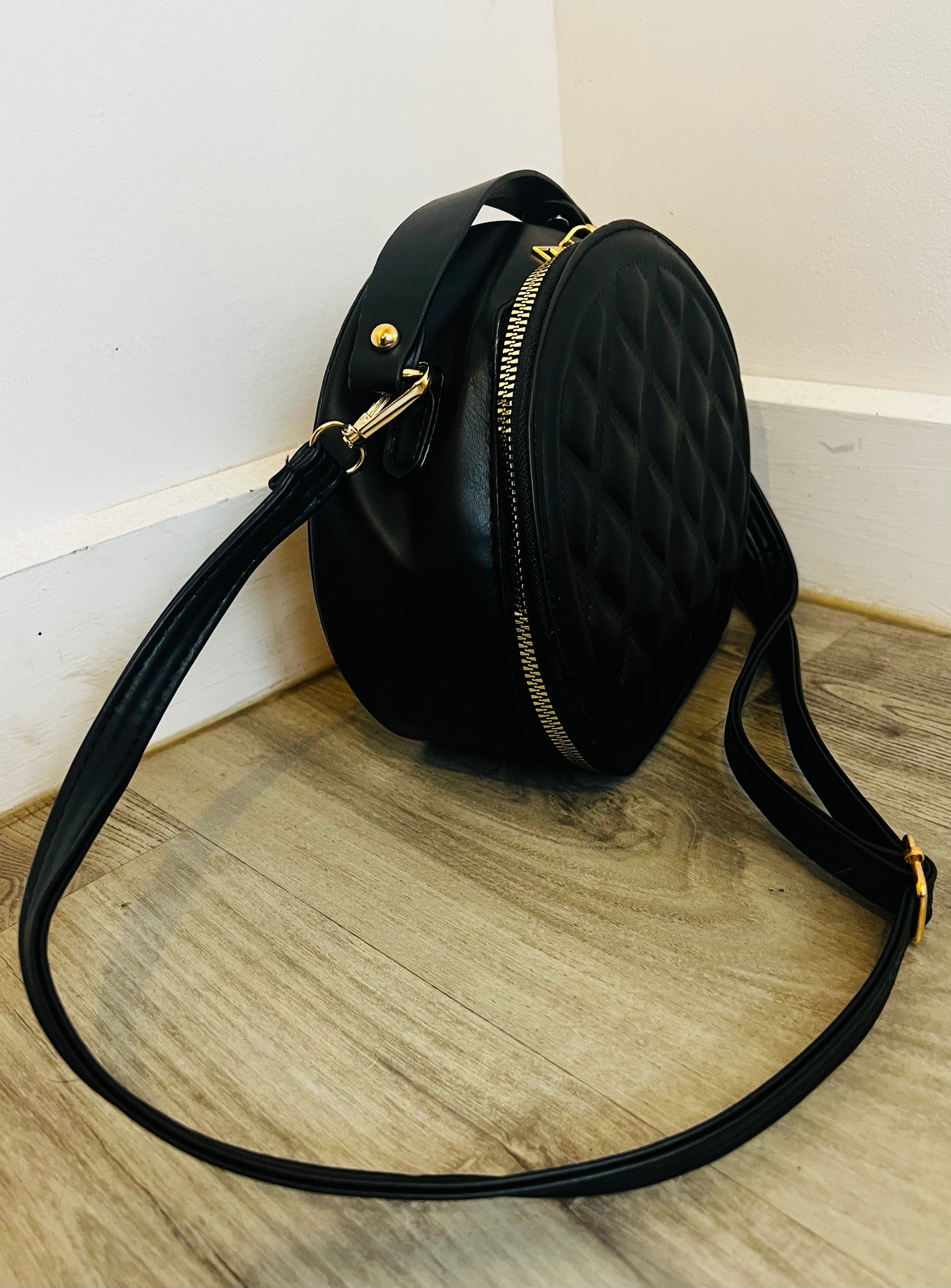 Black mini quilted circle bag