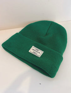 Green beanie with a patch