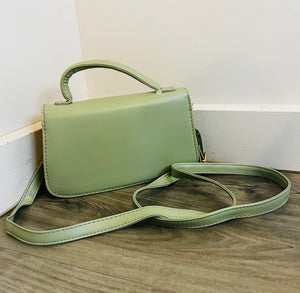 Green quilted flap square bag