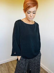 Black flute sleeve top