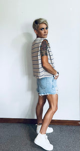 Raw edge distressed denim shorts